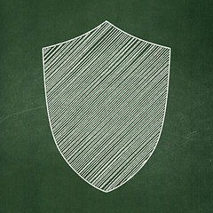 Image showing Security concept: Shield on chalkboard background