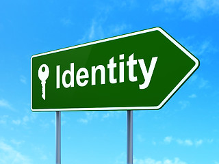 Image showing Protection concept: Identity and Key on road sign background