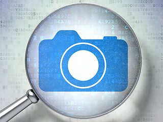 Image showing Travel concept: Photo Camera with optical glass on digital background