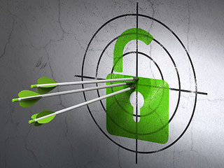 Image showing Safety concept: arrows in Opened Padlock target on wall background