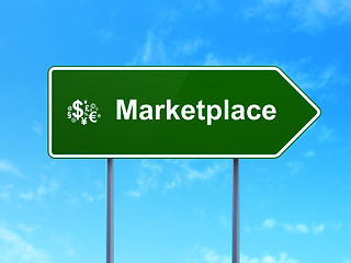 Image showing Advertising concept: Marketplace and Finance Symbol on road sign background