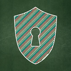 Image showing Privacy concept: Shield With Keyhole on chalkboard background