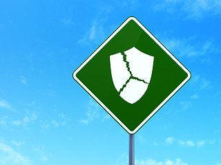 Image showing Privacy concept: Broken Shield on road sign background