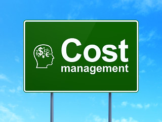 Image showing Finance concept: Cost Management and Head With Finance Symbol on road sign background