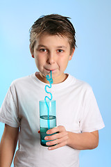 Image showing Child drinking water