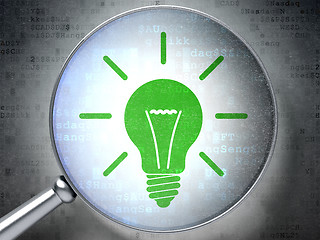 Image showing Business concept: Light Bulb with optical glass on digital background