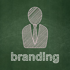 Image showing Marketing concept: Business Man and Branding on chalkboard background