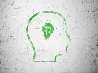 Image showing Marketing concept: Head With Lightbulb on wall background