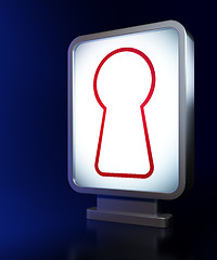 Image showing Safety concept: Keyhole on billboard background