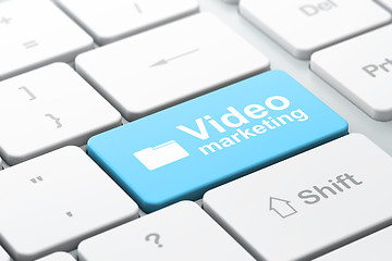 Image showing Finance concept: Folder and Video Marketing on computer keyboard background