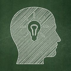 Image showing Education concept: Head With Light Bulb on chalkboard background