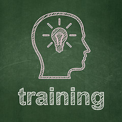 Image showing Education concept: Head With Lightbulb and Training on chalkboard background