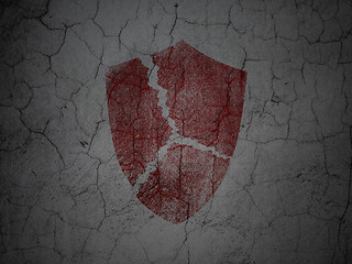 Image showing Privacy concept: Broken Shield on grunge wall background