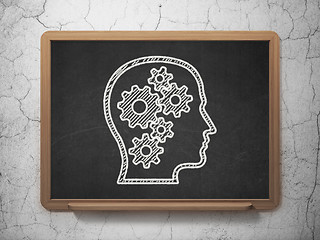 Image showing Information concept: Head With Gears on chalkboard background