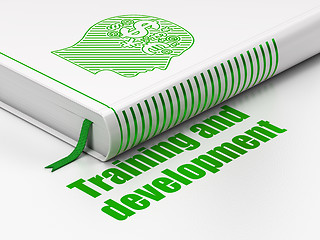 Image showing Education concept: book Head With Finance Symbol, Training and Development on white background