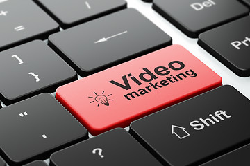 Image showing Business concept: Light Bulb and Video Marketing on computer keyboard background