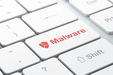 Image showing Protection concept: Broken Shield and Malware on computer keyboard background