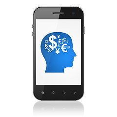 Image showing Finance concept: Head With Finance Symbol on smartphone