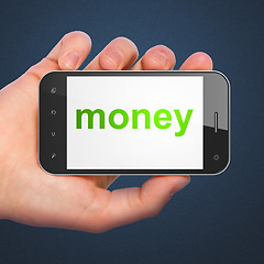 Image showing Finance concept: Money on smartphone