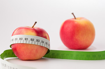 Image showing Fresh apples with centimeter