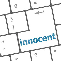 Image showing innocent word on computer pc keyboard key