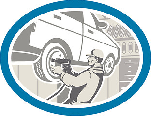 Image showing Mechanic Changing Car Tire Repair Retro