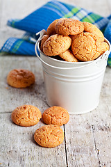 Image showing meringue almond cookies in bucket 