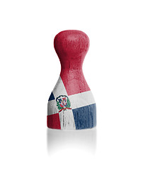 Image showing Wooden pawn with a flag painting