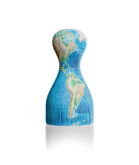 Image showing Wooden pawn with a painting of a map