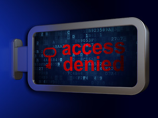 Image showing Security concept: Access Denied and Key on billboard background