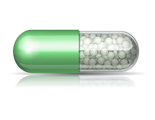 Image showing Medical green capsule with granules