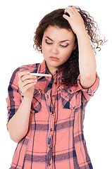 Image showing Girl with pregnancy test