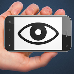 Image showing Security concept: Eye on smartphone