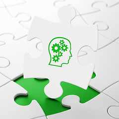 Image showing Finance concept: Head With Gears on puzzle background