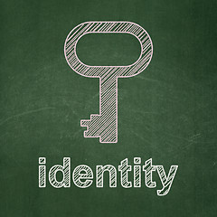 Image showing Security concept: Key and Identity on chalkboard background