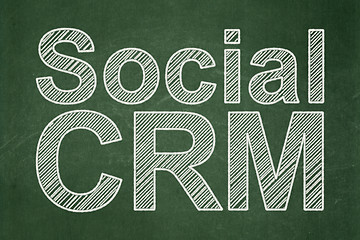 Image showing Business concept: Social CRM on chalkboard background