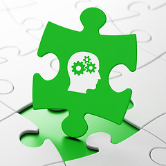 Image showing Marketing concept: Head With Gears on puzzle background