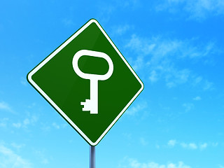 Image showing Security concept: Key on road sign background