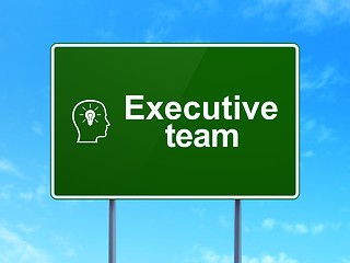 Image showing Finance concept: Executive Team and Head With Lightbulb