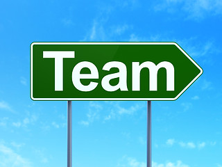Image showing Business concept: Team on road sign background