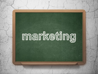 Image showing Advertising concept: Marketing on chalkboard background