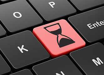 Image showing Time concept: Hourglass on computer keyboard background