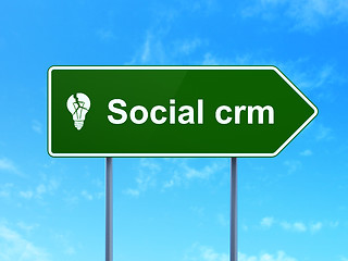 Image showing Business concept: Social CRM and Light Bulb on road sign