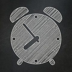 Image showing Time concept: Alarm Clock on chalkboard background