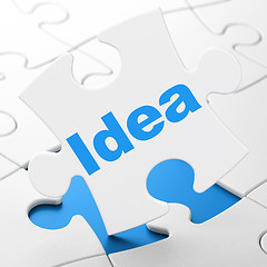 Image showing Advertising concept: Idea on puzzle background