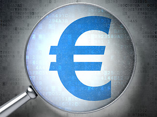 Image showing Currency concept: Euro with optical glass on digital background