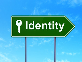 Image showing Protection concept: Identity and Key on road sign background