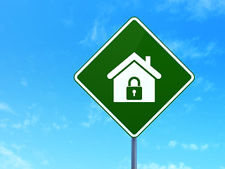 Image showing Finance concept: Home on road sign background
