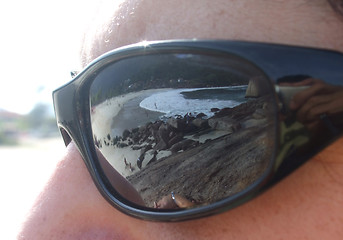 Image showing Beach view reflected on the sunglasses
