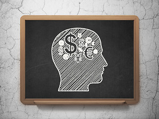 Image showing Advertising concept: Head With Finance Symbol on chalkboard